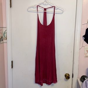 This is a backside washed dark pink swim cover-up